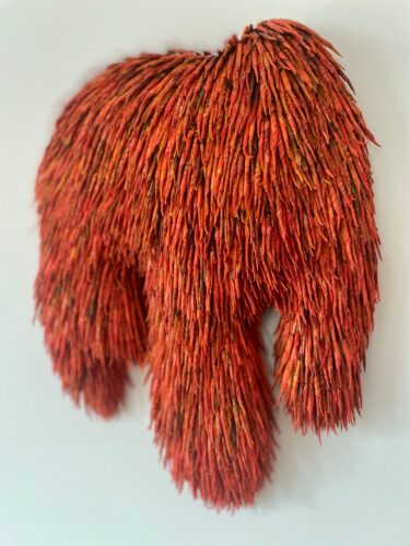 Furry Slide (2025), 42x31x4 cm, magazines, spray paint, ink, foam on mdf board, € 1250,-